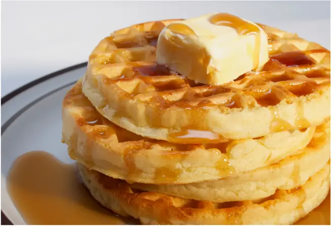 Eggo waffles with butter and syrup